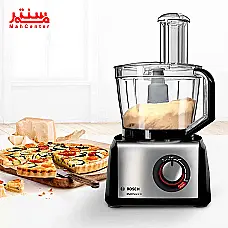 تصویر یک غذاساز بوش با لوازم جانبی کامل، شامل مخلوط‌کن، آب مرکبات‌گیر، همزن، تیغه‌های مختلف و ابزارهای جانبی، با طراحی مدرن و بدنه استیل ضد زنگ. - دوم